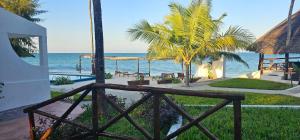 a view of the ocean from a resort at AVO Boutique Hotel in Dikoni