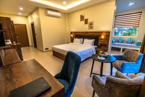 Letto o letti in una camera di Aotel by Clarks Inn Palampur