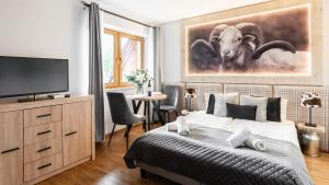 Posteľ alebo postele v izbe v ubytovaní Aparthotel Delta Białka