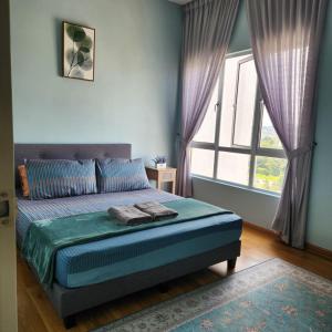 Postel nebo postele na pokoji v ubytování EQhaleef Home_Ostia Bangi