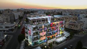 an overhead view of a building in a city at Rise Urban Art Hotel in Larnaca