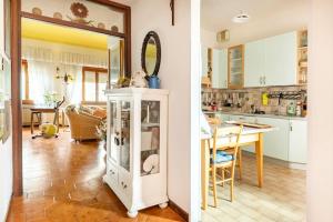 Kuchyň nebo kuchyňský kout v ubytování Casa delle orchidee
