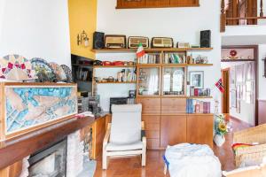 Kuchyň nebo kuchyňský kout v ubytování Casa delle orchidee