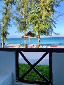 a view of the beach from a window at AVO Boutique Hotel in Dikoni