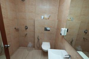 Koupelna v ubytování Hotel Sky Palace Kannur + 12 fotografií