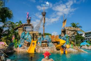 a water park at a resort with a water slide at Khaolak Emerald Beach Resort and Spa in Khao Lak