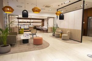 Posedenie v ubytovaní VacationClub Royal Tulip Sand Apartament 309