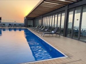 Бассейн в K108 Hotel Doha или поблизости