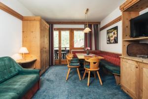 Posezení v ubytování Ferienresidenz Raich - Appartements mit Sky Wellness und Garten