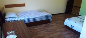 Letto o letti in una camera di Sevan Backstage Garden