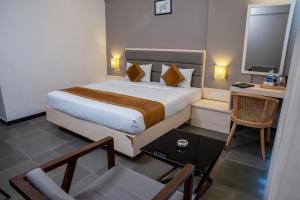 Hotel Dwarawata客房内的一张或多张床位