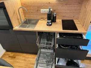 Η κουζίνα ή μικρή κουζίνα στο 1,5-Zimmer, Top ausgestattet, 4 Pers, Souterrain, Self Check-in, Parkplatz, Netflix & Amazon Prime