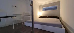 Postel nebo postele na pokoji v ubytování Tourist Homestay