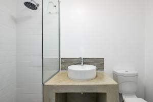 a bathroom with a sink and a toilet at San Lameer Villa 1914 - 2 Bedroom Standard - 4 pax - San Lameer Rental Agency in Southbroom +19 photos