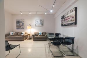 Posedenie v ubytovaní L'appartement blanc dans le centre de Glyfada