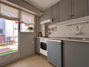 Kuchyň nebo kuchyňský kout v ubytování Apartamento Parola + 20 fotografií