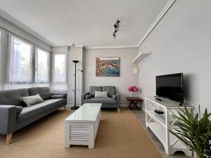 TV a/nebo společenská místnost v ubytování Apartamento Parola