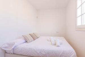 Postel nebo postele na pokoji v ubytování Siesta Mar Loft apartments