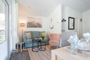 Posezení v ubytování Casa del Mar Scharbeutz - Sauna kostenlos - 1 kleiner Hund willkommen - umzäunter Garten