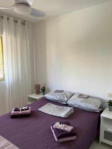 Posteľ alebo postele v izbe v ubytovaní Apartamento PARADISE Solo Familias