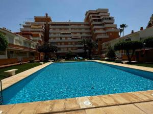 Bazén v ubytovaní Apartamento PARADISE Solo Familias alebo v jeho blízkosti