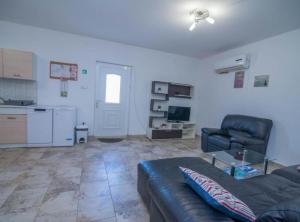 Kuchyňa alebo kuchynka v ubytovaní Apartments Bonic