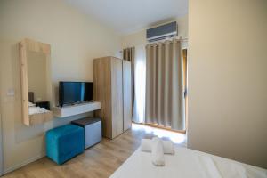 Postel nebo postele na pokoji v ubytování Voyage Villa