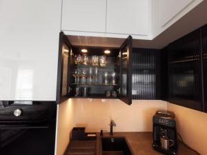 Kuchyňa alebo kuchynka v ubytovaní Smart Apartament Grunwaldzka 240