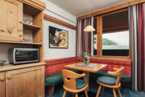 Kuchyň nebo kuchyňský kout v ubytování Ferienresidenz Raich - Appartements mit Sky Wellness und Garten