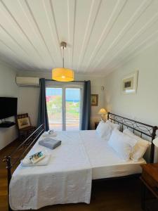 Posteľ alebo postele v izbe v ubytovaní Lefkada Beach Villa + 35 fotografií