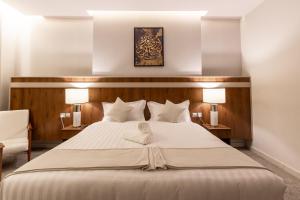 Voodi või voodid majutusasutuse Wassad Hotel Makkah فندق وسد مكة toas