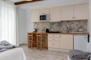 Casa Del Patio - Boutique Apartments的厨房或小厨房