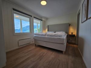 Postel nebo postele na pokoji v ubytování Modern cabin with panorama view