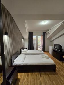 Voodi või voodid majutusasutuse Apartments Philip II toas