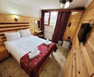 TV a/nebo společenská místnost v ubytování Marmara Guesthouse