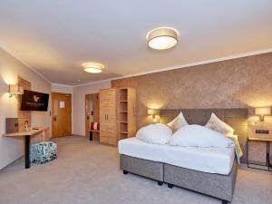 Voodi või voodid majutusasutuse Alp Resort Tiroler Adler toas