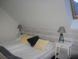 Letto o letti in una camera di Amadea