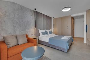 Posteľ alebo postele v izbe v ubytovaní Hotel Laurentum
