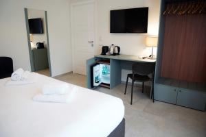 TV a/nebo společenská místnost v ubytování Annunziatella Suite & Rooms