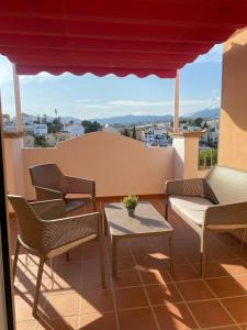 Μπαλκόνι ή βεράντα στο Ático en Nerja con vistas espectaculares +10 φωτογραφίες