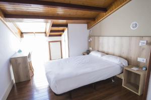 Cama o camas de una habitación en Hotel Alda Avenida