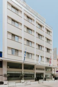 a rendering of the front of the hotel at Gallery Central Piraeus Port in Piraeus