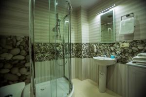 Koupelna v ubytování Aparthotel Holiday Lux Batumi