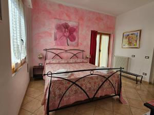 Postel nebo postele na pokoji v ubytování Guest house Il Giardino in Città