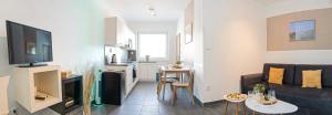 mały apartament z salonem i kuchnią w obiekcie Penzion Stará hora w mieście Velké Pavlovice