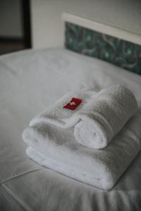 Voodi või voodid majutusasutuse Albergo Robiei toas