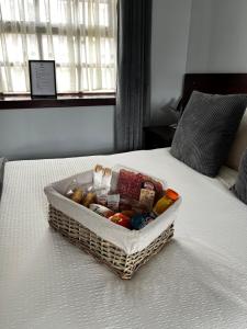 a basket of vegetables sitting on a bed at The Stag Hotel in Banchory