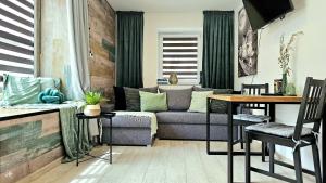 Posedenie v ubytovaní Apartament Słoneczne Okno