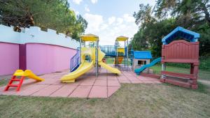 a group of playground equipment on a patio at Sunrise Resort Hotel in Kizilagac
