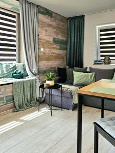 Posedenie v ubytovaní Apartament Słoneczne Okno